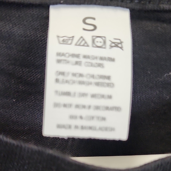 Elegant Black Tee with Pink Floral Perfume Design - Picture 2 of 3